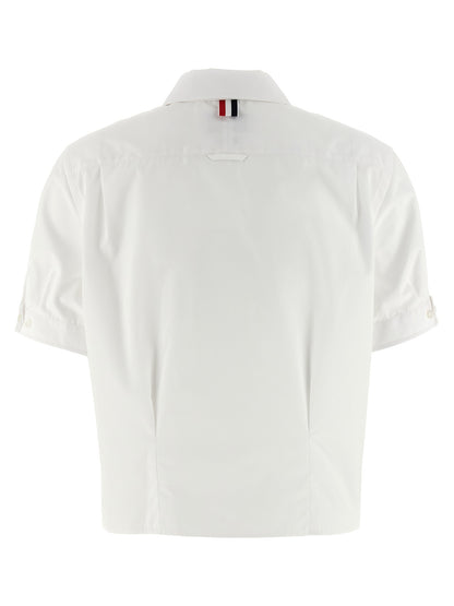 Blouse by Thom Browne for women in cotton white showcases a sleek silhouette, elegantly detailed with a sleek and for a sleek finish.