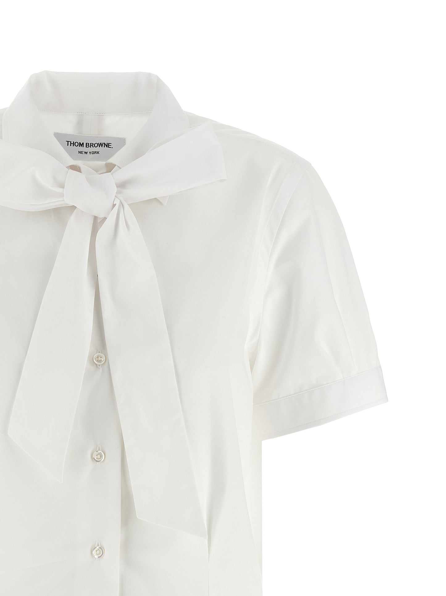 Blouse by Thom Browne for women in cotton white presents a discerning silhouette, showcasing a sophisticated and for a truly discerning finish.