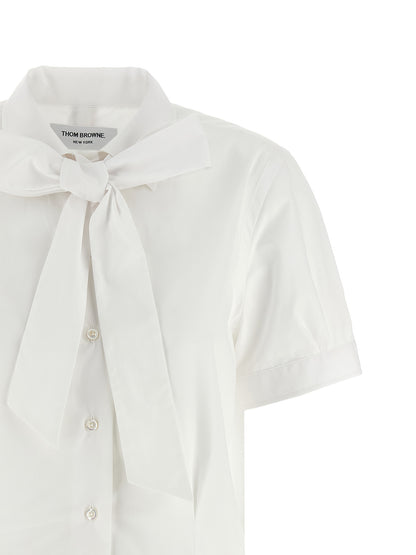 Blouse by Thom Browne for women in cotton white presents a discerning silhouette, showcasing a sophisticated and for a truly discerning finish.