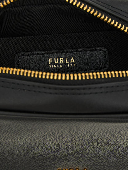 Compact Handbag by Furla for women in bos taurus calf suede leather black & gold presents a ornamental silhouette, showcasing a secure zipper, ample , and versatile shoulder-strap, adjustable-strap & handle for a ornamental finish.