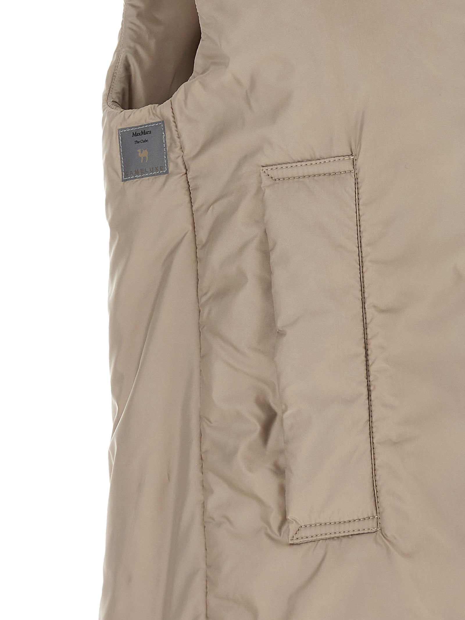 Hooded Vest by Max Mara for women in polyester beige & black showcases a utilitarian silhouette, artfully incorporating pockets & hooded and a utilitarian for a truly utilitarian finish.
