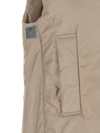 Hooded Vest by Max Mara for women in polyester beige & black showcases a utilitarian silhouette, artfully incorporating pockets & hooded and a utilitarian for a truly utilitarian finish.