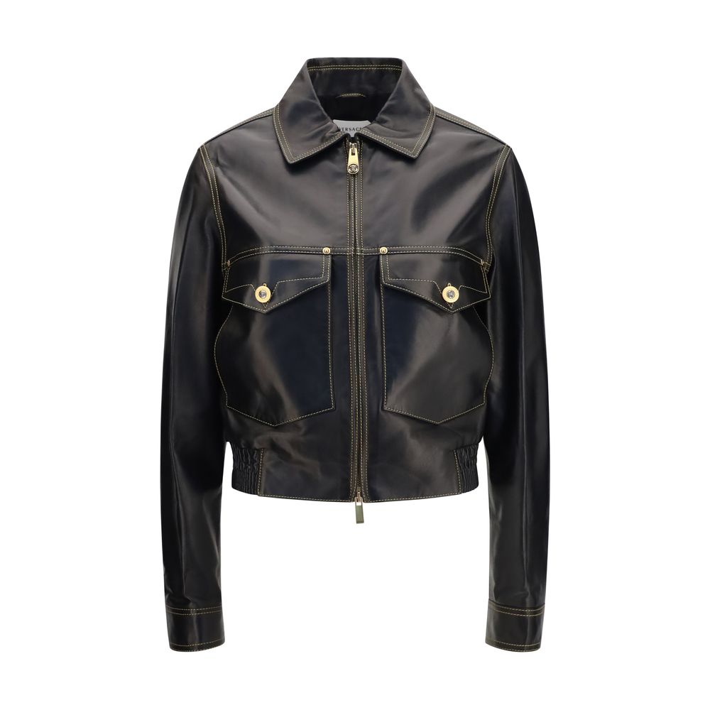 Jacket by Versace for women in nappa leather black showcases a contemporary silhouette, detailed with a contemporary shirt-collar neckline and premium pockets for a sophisticated finish.