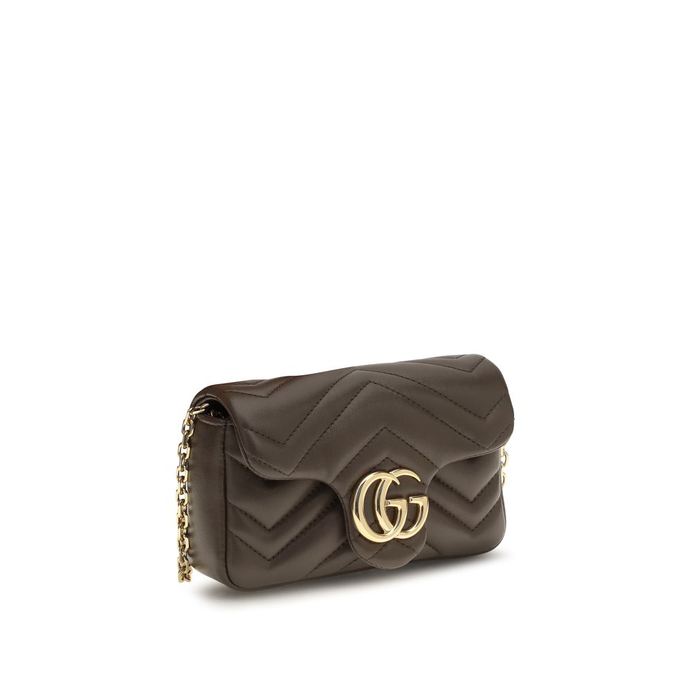 This Shoulder Handbag by Gucci for women in bos taurus calf nappa leather and brown, gold, chevron & signature presents a sculptural silhouette featuring a secure snap & magnetic, ample , and versatile shoulder-strap for a sculptural finish.