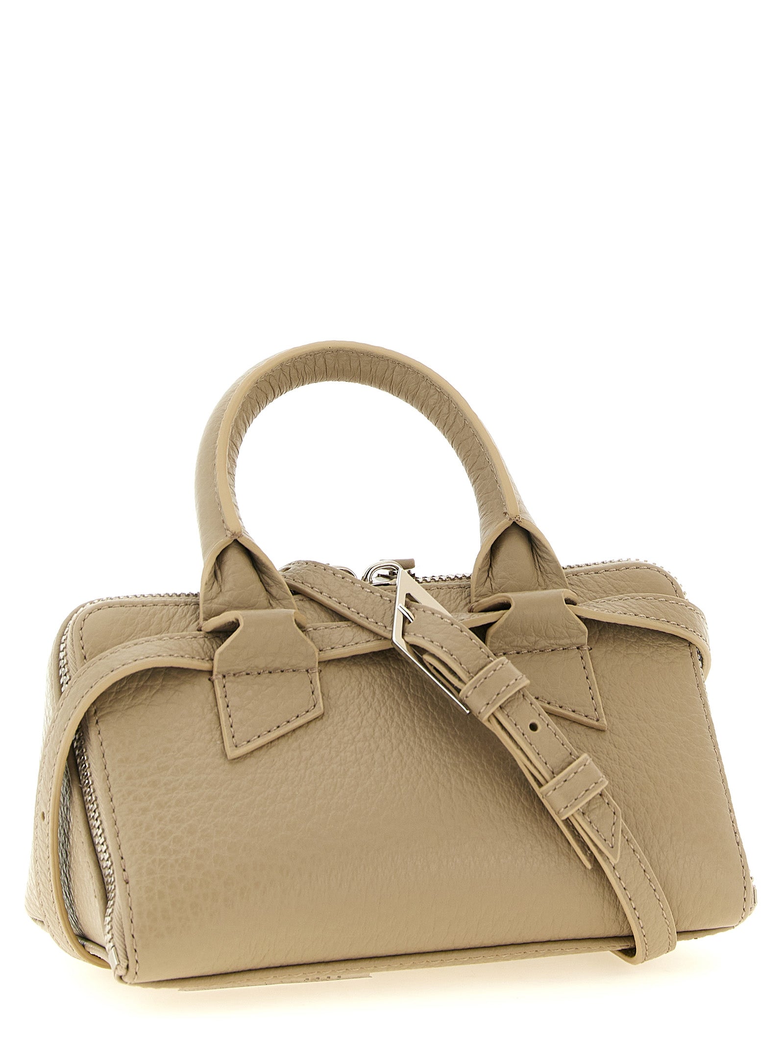 This Mini Handbag by The Attico for women in calf leather and beige, sand & silver presents a sculptural silhouette featuring a secure zipper, ample , and versatile shoulder-strap, handle & detachable-strap for a sculptural finish.