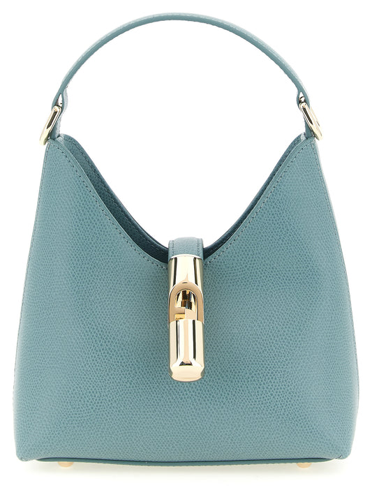 This Mini Handbag by Furla for women in calfskin leather and gold, light-blue & signature presents a sculptural silhouette featuring a secure zipper, ample , and versatile shoulder-strap, handle & adjustable-strap for a sculptural finish.