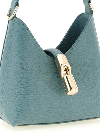 Mini Handbag by Furla for women in calfskin leather gold, light-blue & signature features a refined silhouette, showcasing a secure zipper, organized , and versatile shoulder-strap, handle & adjustable-strap for a refined finish.