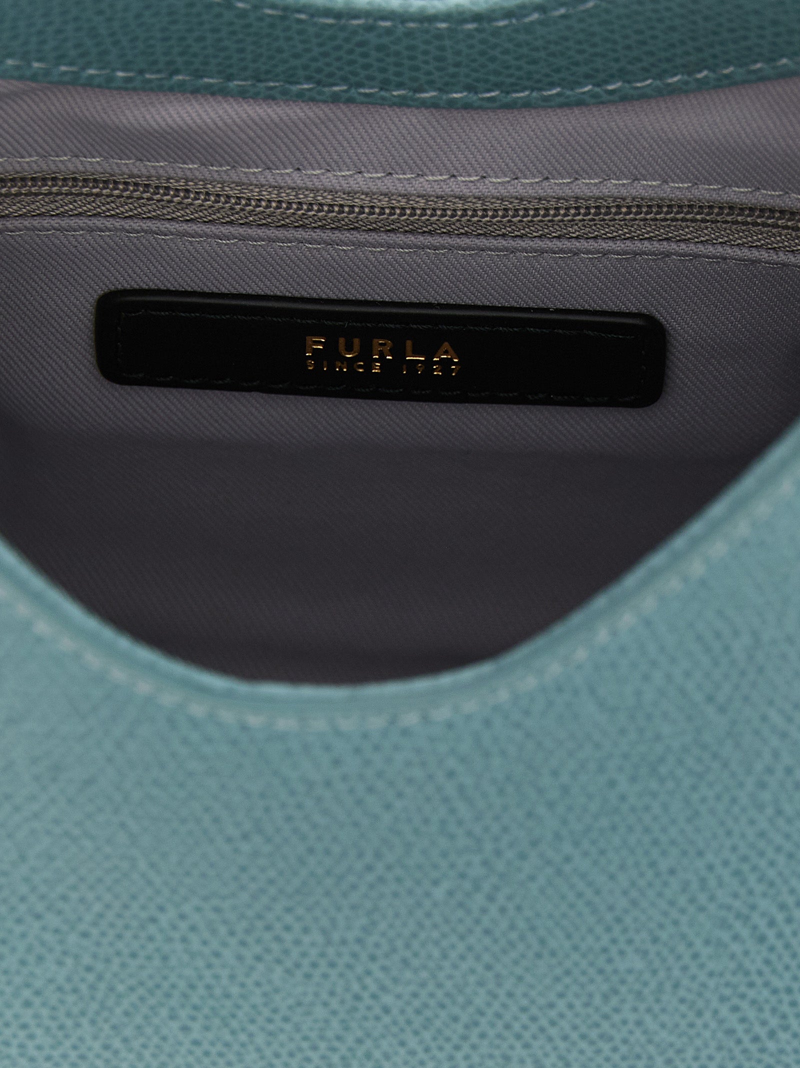 Mini Handbag by Furla for women in calfskin leather gold, light-blue & signature features a exquisite silhouette, showcasing a secure zipper and exquisite with versatile shoulder-strap, handle & adjustable-strap for a exquisite finish.
