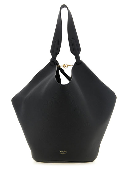 Tote Clutch Bag by Khaite for women in bos taurus calfskin leather black & gold features an jet-setting Lotus Bos Taurus Calfskin Leather Tote Clutch Bag design with a secure , jet-setting , and versatile handle for a jet-setting look.