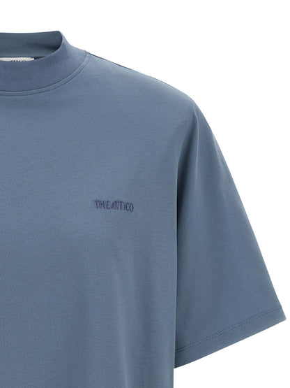 T-Shirt by The Attico for women in cotton blue showcases a dramatic silhouette, elegantly detailed with a dramatic mock neckline and for a truly dramatic finish.