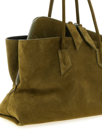 Medium Shoulder Bag by The Attico for women in bos taurus calf suede leather bicolour, green & olive presents a statuesque silhouette, showcasing a secure zipper and statuesque with versatile shoulder-strap & handle for a sophisticated look.