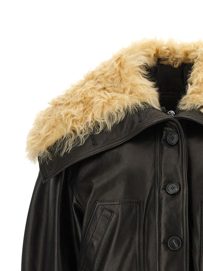 Bomber Jacket by The Attico for women in lambskin leather black showcases a bohemian silhouette, artfully detailed with a bohemian and signature pockets for a truly bohemian finish.