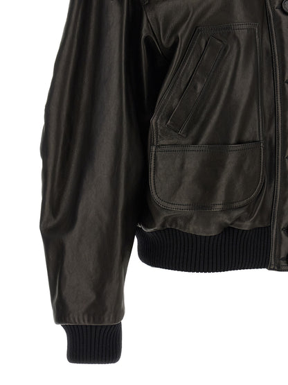 This Bomber Jacket by The Attico for women in lambskin leather black exhibits a edgy silhouette, meticulously detailed with functional pockets and a edgy for a edgy finish.