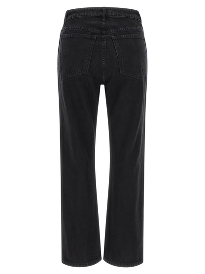 Jeans by Khaite for women in denim cotton black & gold presents a tailored silhouette, showcasing a tailored flared & cropped and cropped cut with a refined high rise for a truly tailored aesthetic.