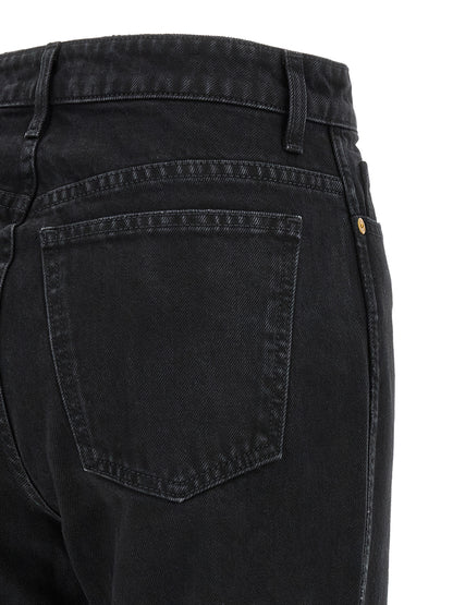 Jeans by Khaite for women in denim cotton black & gold features an sophisticated high rise and flared & cropped with a precise cropped, creating a sophisticated and sophisticated silhouette.
