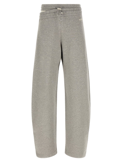 Casual Pants by The Attico for women in cotton gray features an refined tailoring silhouette, showcasing a premium relaxed-fit & wide with a and long cut for a refined tailoring look.