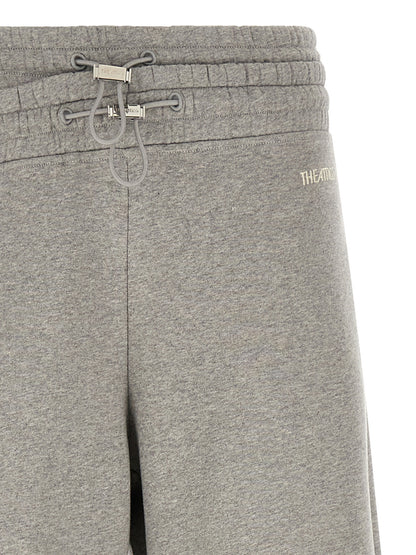 Casual Pants by The Attico for women in cotton gray presents a tailored silhouette, showcasing a tailored relaxed-fit & wide and long cut with a refined for a truly tailored aesthetic.