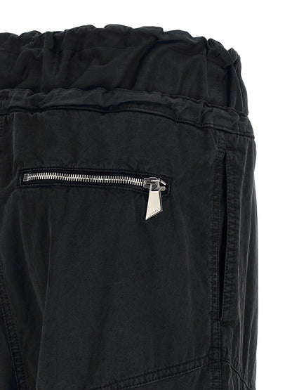 Cargo Pants by The Attico for women in polyamide polyurethane & cotton black features a sartorial silhouette, showcasing a sophisticated oversized with a refined long and elegant .