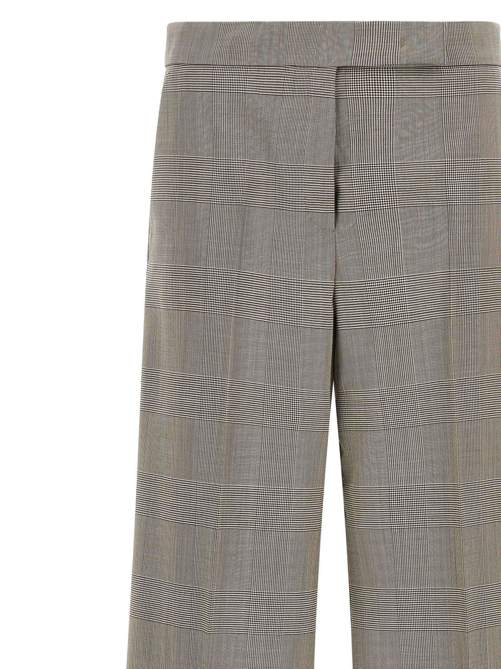 Trousers by Max Mara for women in virgin wool gray features a tailored silhouette with a tailored wide, defined by its long and a sophisticated high rise.