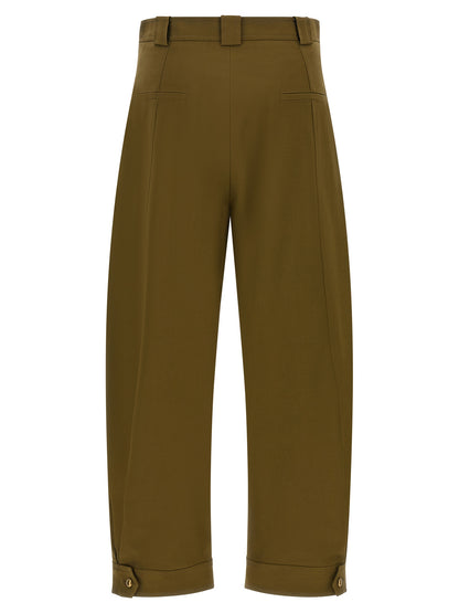 Trousers by Max Mara for women in stretch cotton canvas bicolour, gold, green & olive presents a perennial silhouette, meticulously tailored with a wide & cropped cut, cropped finish, and an elegant .