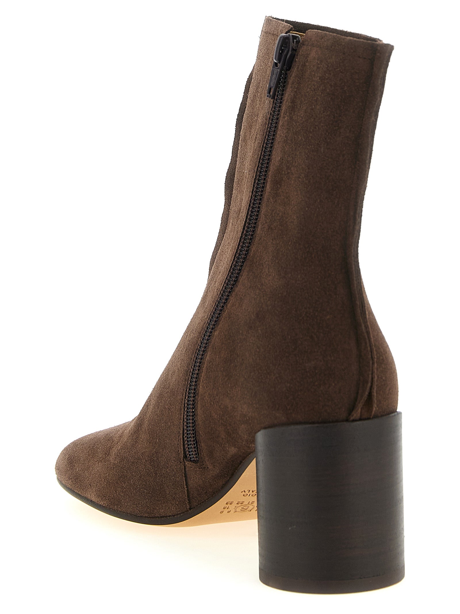 Ankle Boots by MM6 Maison Margiela for women in cowhide suede leather brown features an effortless chic silhouette from the Women's Cowhide Suede Leather Ankle Boots collection, showcasing a effortless chic block-heel and refined for an effortless chic look.