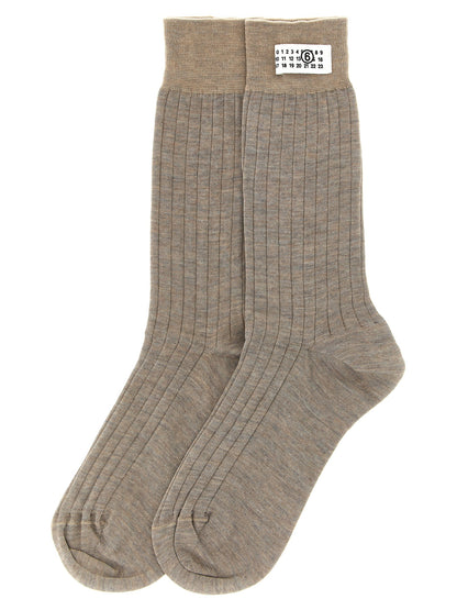 Socks by MM6 Maison Margiela for women in polyamide wool beige & signature features a nuanced silhouette, showcasing the nuanced Women's Polyamide Wool Socks design with a refined, premium finish.