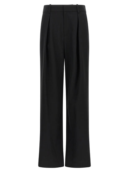 Trousers by MM6 Maison Margiela for women in polyester & virgin wool black, white & jacquard presents a smart silhouette, meticulously detailed with a smart wide, a smart long, and a smart high rise.