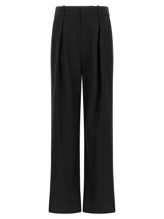 Trousers by MM6 Maison Margiela for women in polyester & virgin wool black, white & jacquard presents a smart silhouette, meticulously detailed with a smart wide, a smart long, and a smart high rise.
