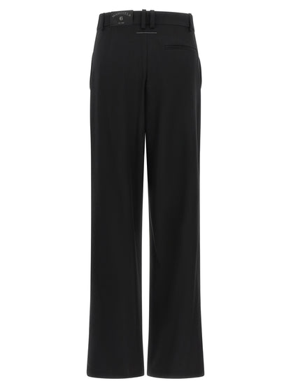 Trousers by MM6 Maison Margiela for women in polyester & virgin wool black, white & jacquard features a artisanal silhouette, showcasing a sophisticated wide with a long and high rise for a artisanal finish.