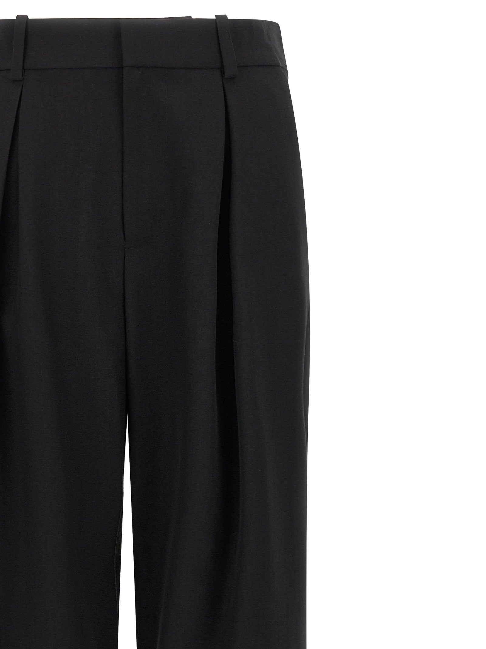 Trousers by MM6 Maison Margiela for women in polyester & virgin wool black, white & jacquard presents a perennial silhouette, meticulously tailored with a wide cut, long finish, and an elegant high rise.