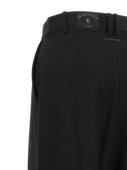 Trousers by MM6 Maison Margiela for women in polyester & virgin wool black, white & jacquard features an on trend silhouette, showcasing a sophisticated wide with a long and high rise for an on trend finish.
