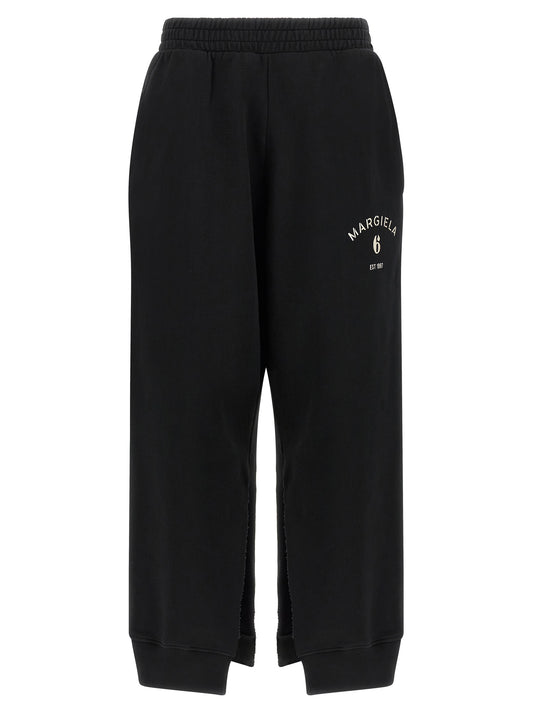 Joggers by MM6 Maison Margiela for women in cotton black, white & signature features an sartorial athletic & relaxed-fit and long with a cut for a sartorial finish.