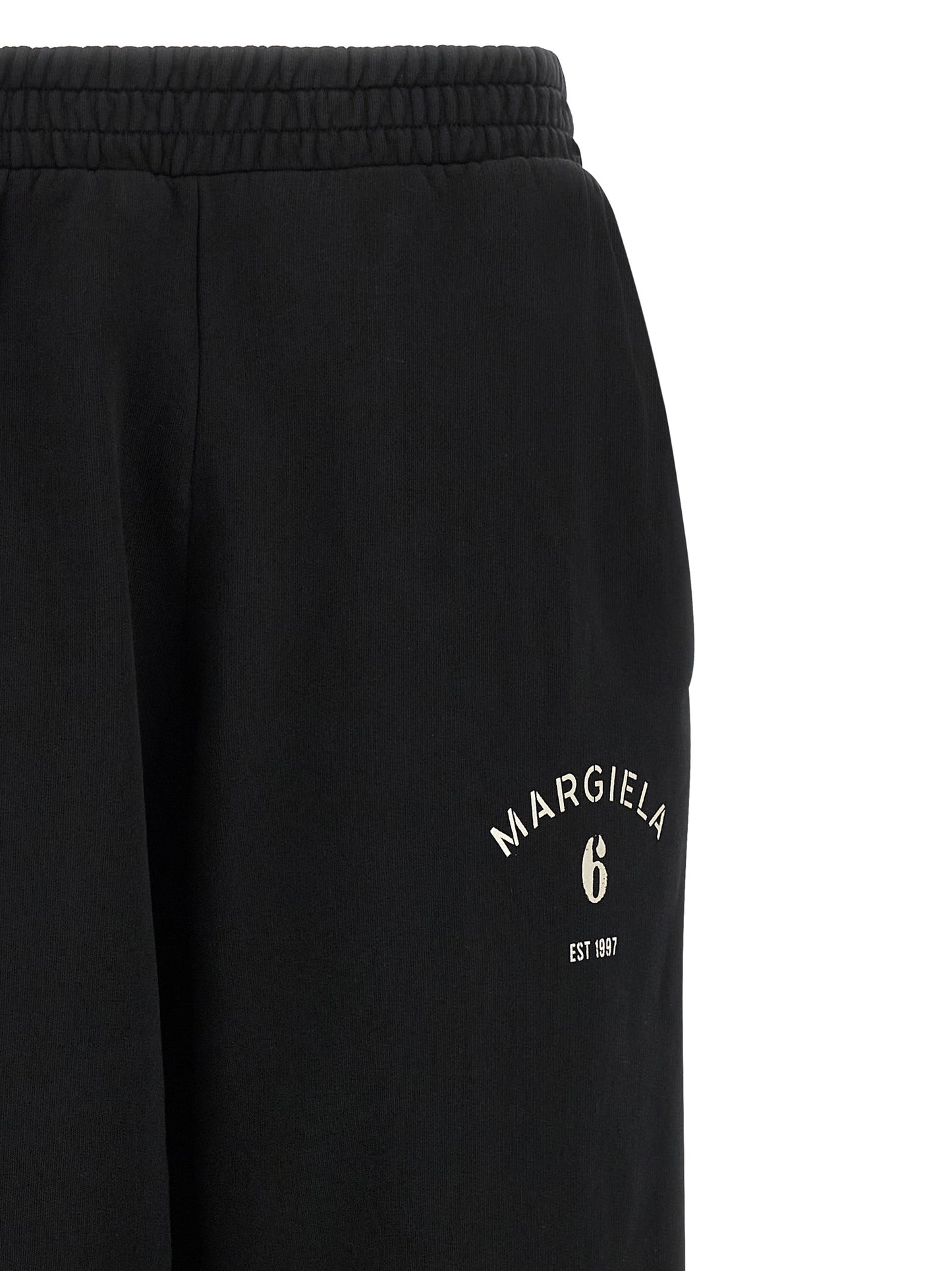 Joggers by MM6 Maison Margiela for women in cotton black, white & signature features an sartorial athletic & relaxed-fit and long with a cut for a sartorial finish.