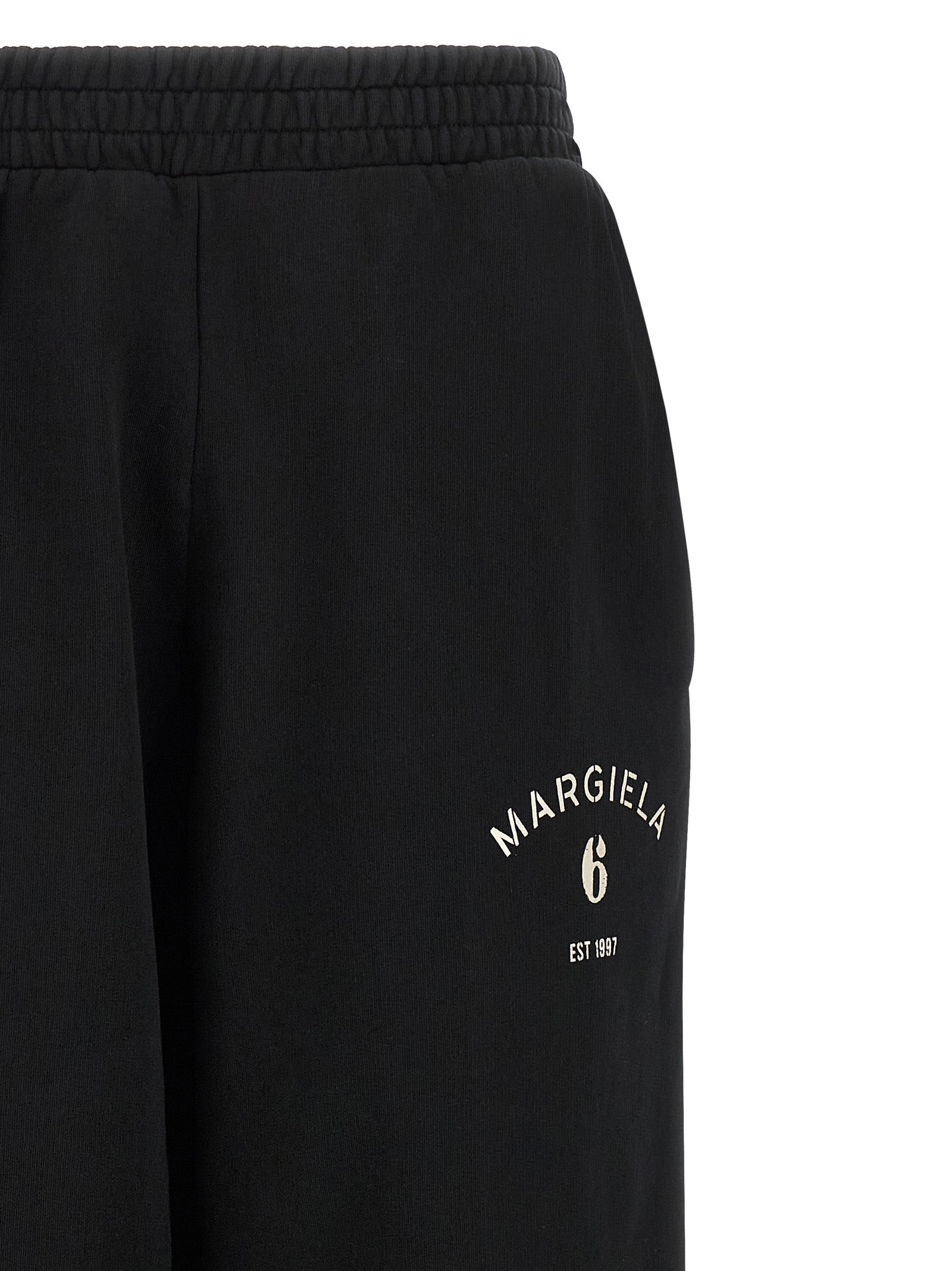 Joggers by MM6 Maison Margiela for women in cotton black, white & signature features an sartorial athletic & relaxed-fit and long with a cut for a sartorial finish.