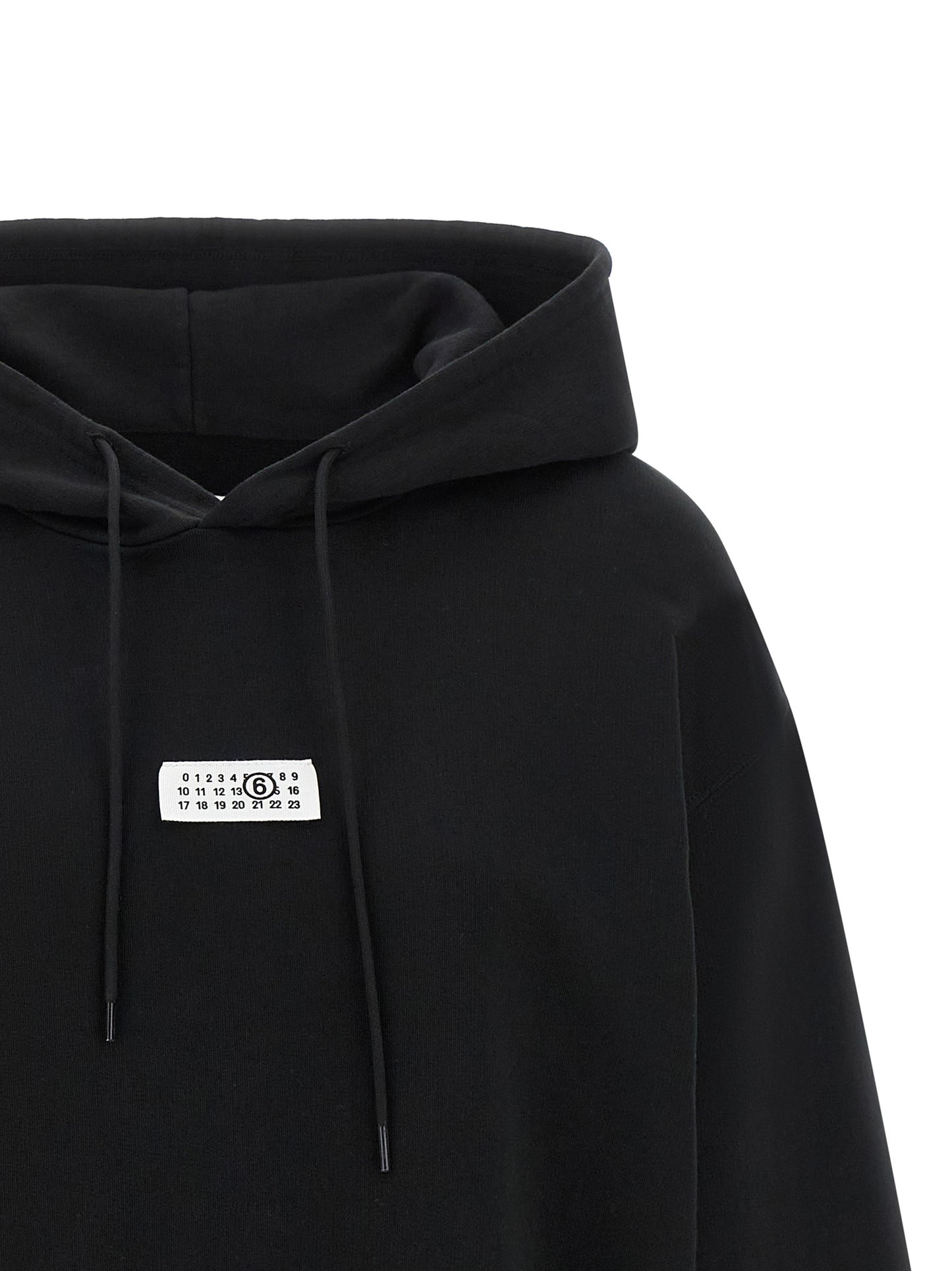 Sweatshirt Hoodie by MM6 Maison Margiela for women in cotton black, white & signature features an luminous silhouette, showcasing a sophisticated hooded neckline and for a truly luminous look.