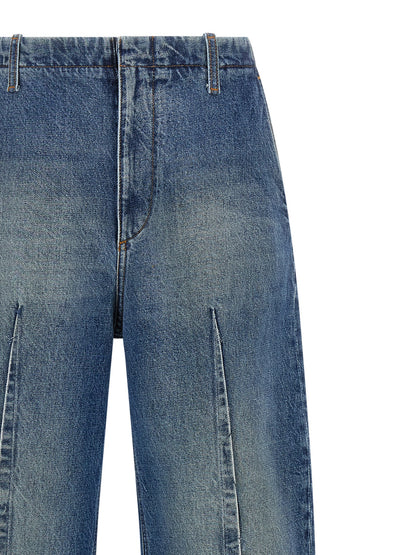 Jeans by MM6 Maison Margiela for women in denim cotton blue & white features an sophisticated high rise and with a precise long, creating a sophisticated and sophisticated silhouette.