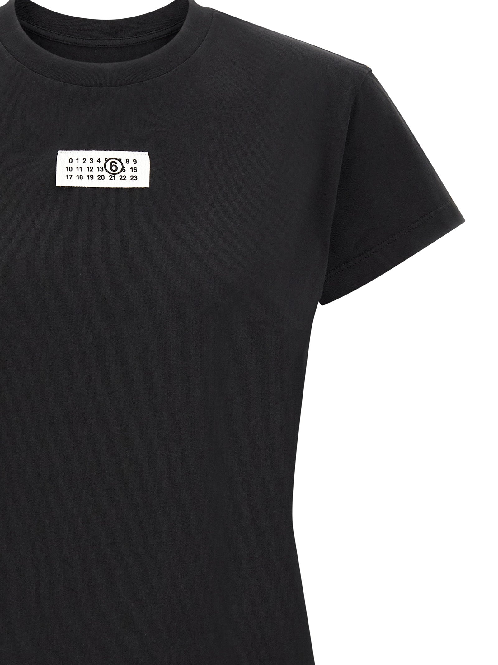 T-Shirt by MM6 Maison Margiela for women in cotton black, white & signature showcases a unassuming silhouette, artfully detailed with a refined and unassuming for a sophisticated, contemporary look.