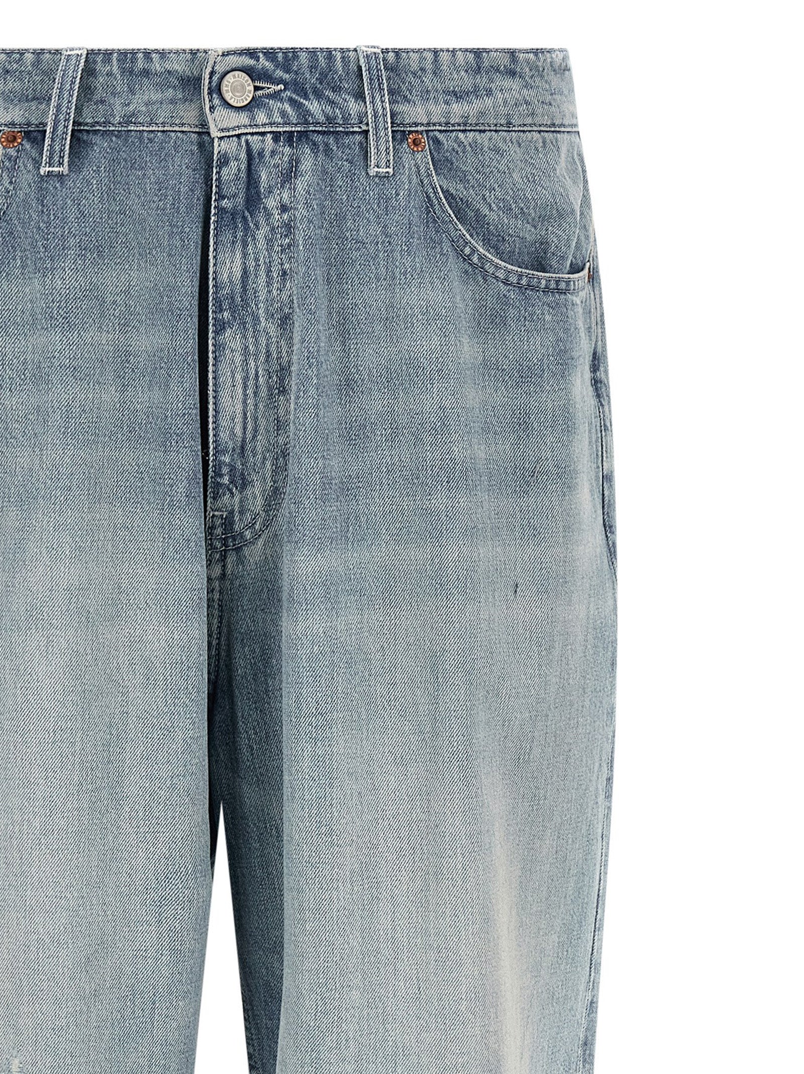 Jeans by MM6 Maison Margiela for men in denim cotton light-blue, white & signature presents a tailored silhouette, showcasing a tailored straight-leg & relaxed-fit and long cut with a refined for a truly tailored aesthetic.