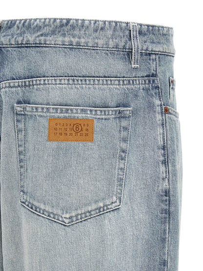 Jeans by MM6 Maison Margiela for men in denim cotton light-blue, white & signature features an refined tailoring silhouette, showcasing a premium straight-leg & relaxed-fit with a and long cut for a refined tailoring look.