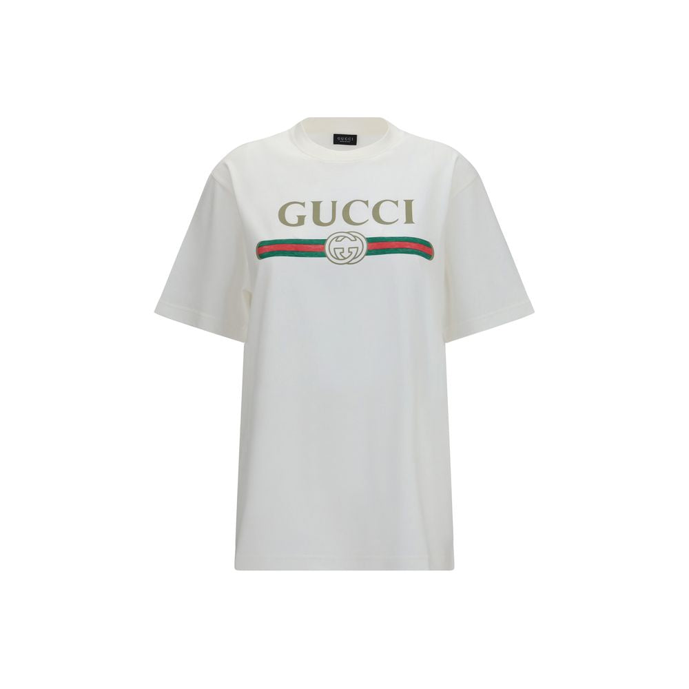 T-Shirt by Gucci for women in cotton & silk white & print showcases a chic silhouette, artfully detailed with a chic crew neckline and short-sleeve for a chic finish.