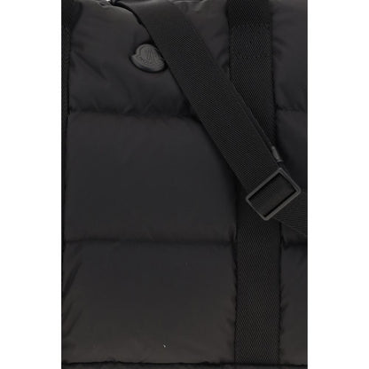 Travel Shoulder Bag by Moncler for men in polyester black & signature features a effortless sophistication silhouette, secured by a zipper with ample and versatile shoulder-strap, adjustable-strap, detachable-strap & handle for a effortless sophistication finish.