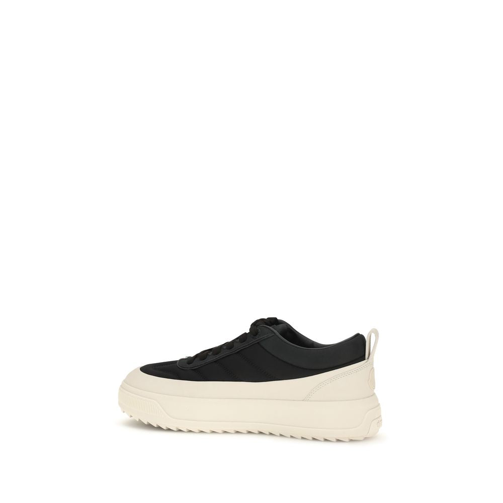 Athletic Sneakers by Moncler for men in eva tu & bos taurus nubuck calf leather black, signature & monogram showcases a architectural silhouette, artfully capturing the essence of the Men's Athletic EVA TU & Bos Taurus Nubuck Calf Leather Sneakers with its signature architectural athletic style construction.