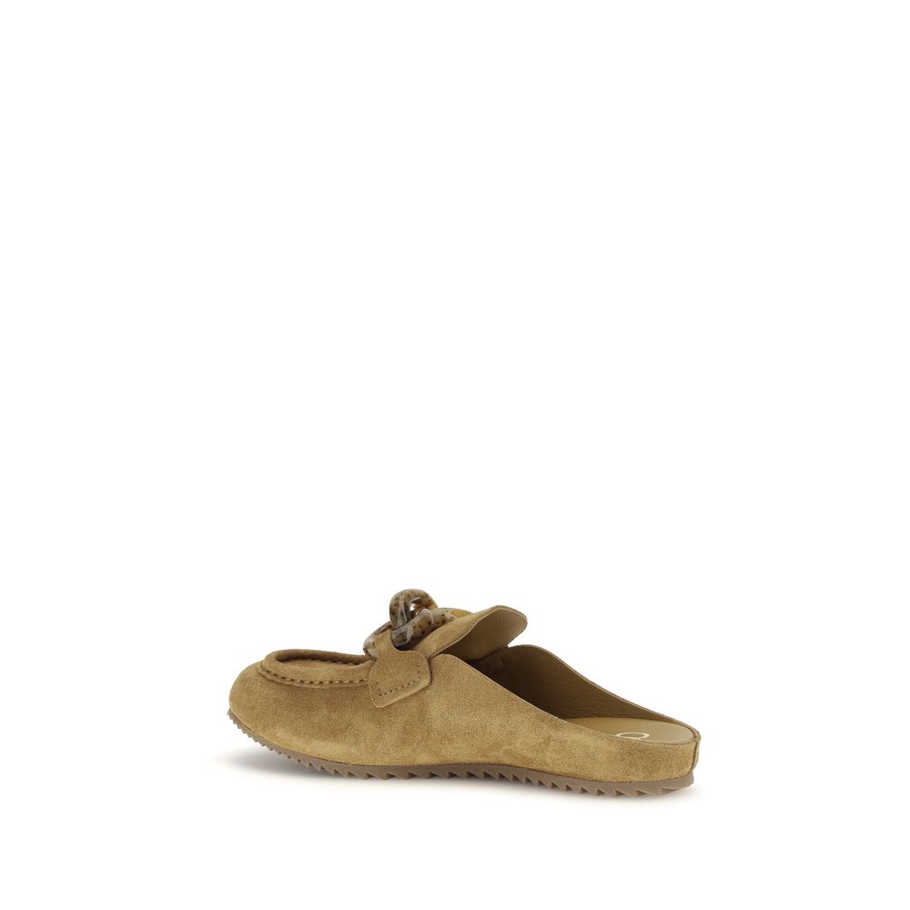 Mules Flat Shoes by Pedro García for women in tu resin & bos taurus cowhide suede leather beige & natural showcases a dynamic silhouette, artfully capturing Women's TU Resin & Bos Taurus Cowhide Suede Leather Mules Flat Shoes through its distinctive and elegant .