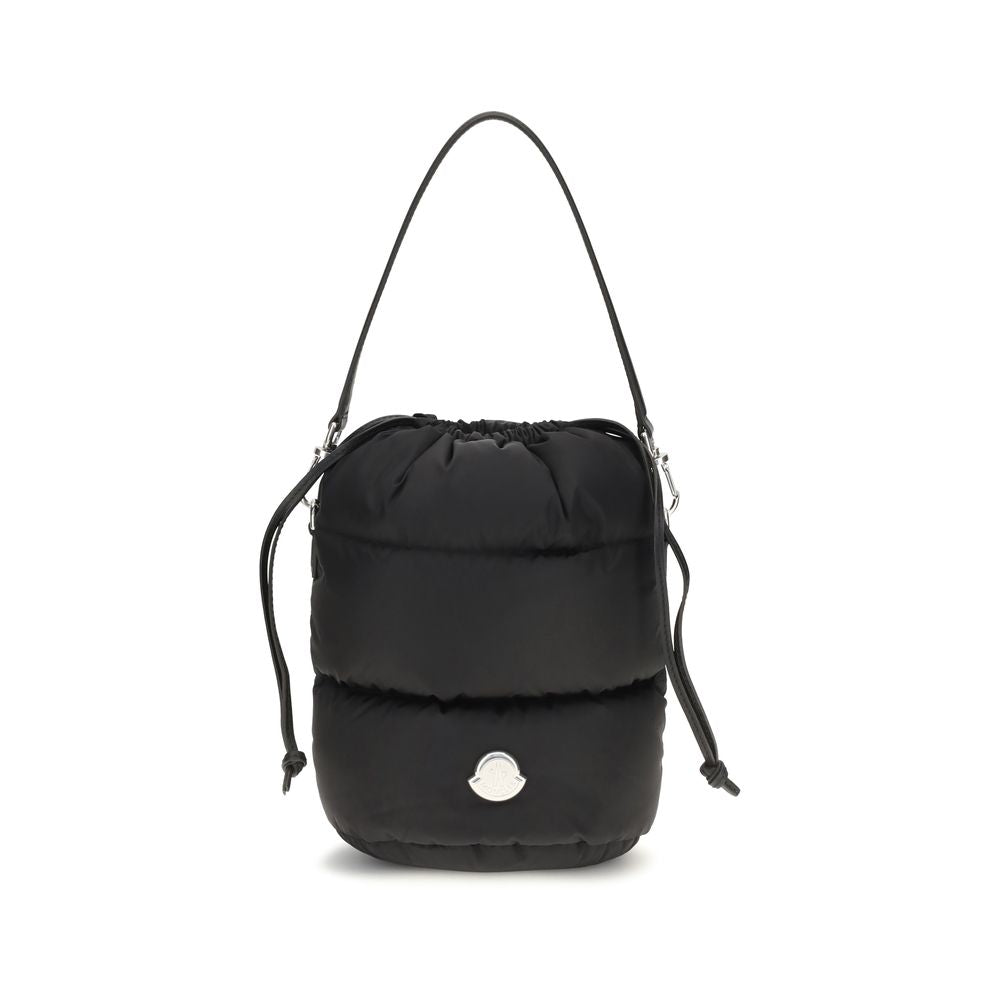 This Bucket Handbag by Moncler for women in nylon leather black & signature presents a effortlessly chic silhouette, featuring a secure drawstring, ample , and versatile shoulder-strap & handle for a effortlessly chic finish.