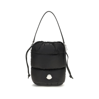 This Bucket Handbag by Moncler for women in nylon leather black & signature presents a effortlessly chic silhouette, featuring a secure drawstring, ample , and versatile shoulder-strap & handle for a effortlessly chic finish.
