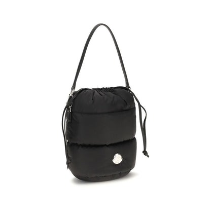 Bucket Handbag by Moncler for women in nylon leather black & signature features an effortlessly chic silhouette, showcasing a secure drawstring, effortlessly chic , and versatile shoulder-strap & handle.
