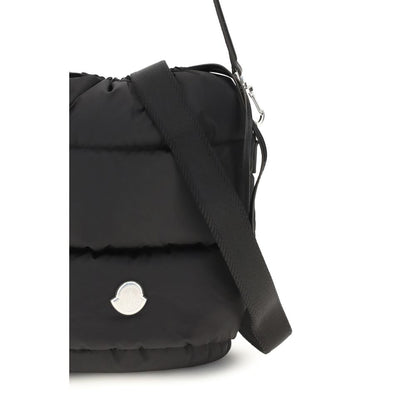 This Bucket Handbag by Moncler for women in nylon leather black & signature presents a effortlessly chic silhouette, featuring a secure drawstring, ample , and versatile shoulder-strap & handle for a effortlessly chic finish.