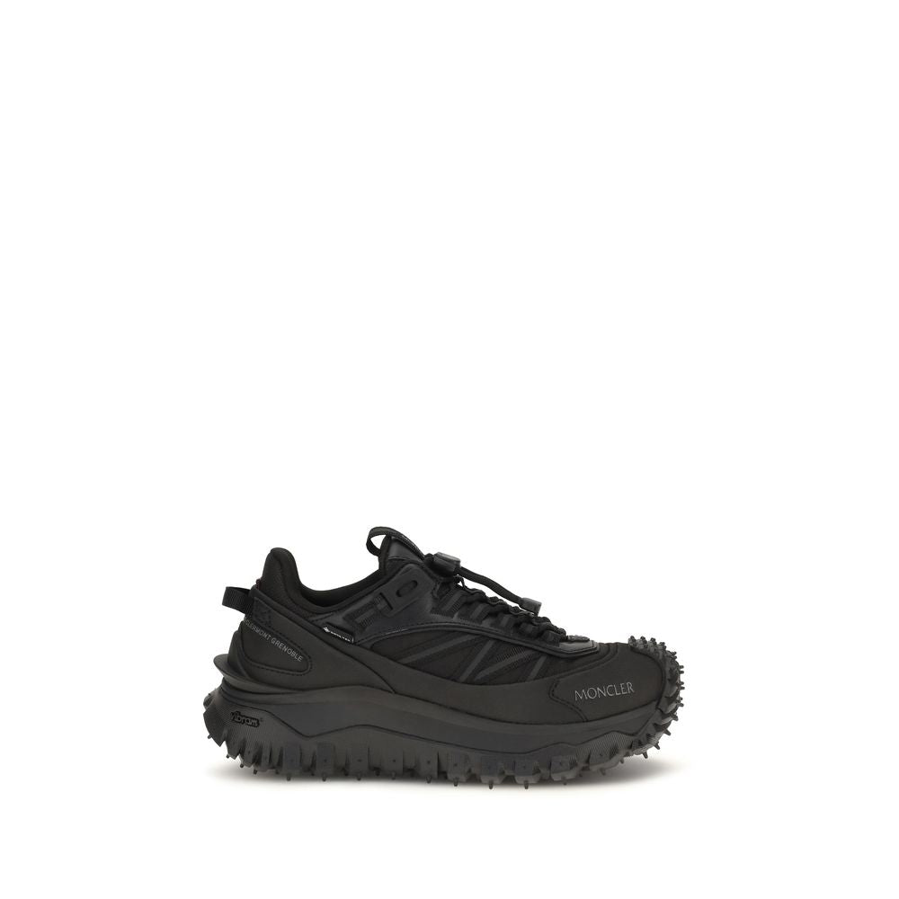 Athletic Sneakers by Moncler for women in bos taurus calf leather black features an timeless silhouette from the Women's Athletic Bos Taurus Calf Leather Sneakers collection, showcasing a timeless athletic style for a timeless look.