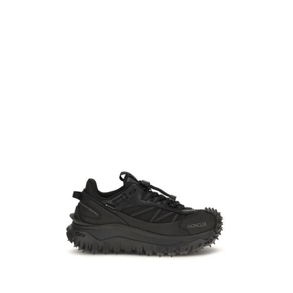 Athletic Sneakers by Moncler for women in bos taurus calf leather black features an timeless silhouette from the Women's Athletic Bos Taurus Calf Leather Sneakers collection, showcasing a timeless athletic style for a timeless look.