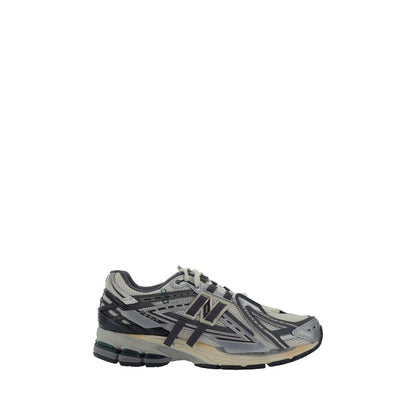 Athletic Sneakers by New Balance for men in fabric mesh silver & monogram presents a sleek silhouette, perfectly capturing the athletic style essence of Men's Athletic Fabric Mesh Sneakers with its sleek design and premium finish.